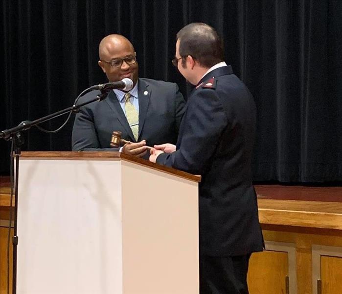 Man receiving an award 