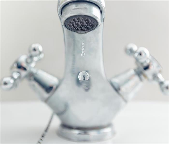 faucet with water leak