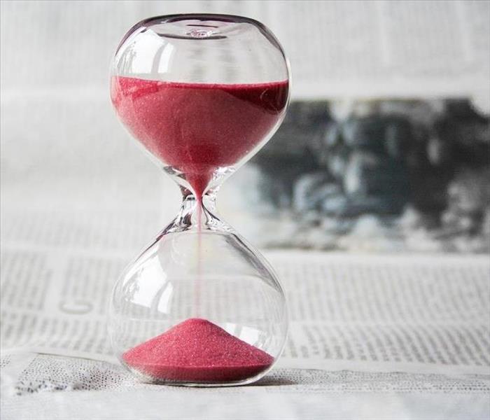 hourglass with red sand
