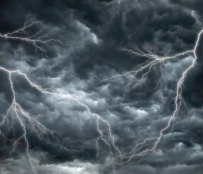lightning strikes in dark stormy sky